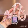 Adecuado para la correa del reloj inteligente Little Genius z9/z10/z11/q1a hilo suave oso con forma de corazón z12 accesorios colgantes