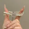 Pulsera de Perlas Gatito Kt Linda Hielo-a-Través Coreana Dulce Doble Capa Moda Versátil Joyería de Mano de Alto Valor para Mujeres