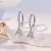 Venta caliente transfronteriza de Amazon Nuevos pendientes colgantes con letra A y circonita joyería de moda de ultramar todo cobre circonita círculo pequeño