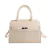 Bolsa cuadrada pequeña de estilo europeo y americano para mujer, para ir al trabajo, nueva moda 2026, chic, simple, de mano, elegante, de hombro y cruzada