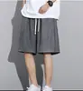 Pantalones cortos de color liso para hombre, pantalones cortos deportivos de baloncesto finos y sueltos de verano, pantalones cortos de secado rápido, pantalones cortos grandes, pantalones casuales de playa