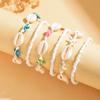 Pulseras de Conchas Apiladas Trenzadas Transfronterizas Europeas y Americanas para Vacaciones en la Playa de Verano, Pulseras de Moda Multicapa de Estrella de Mar Turquesa y Cuentas de Arroz