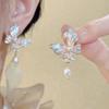 Arete Clip de Camelia de Perla Mosquito Sin Agujeros en la Oreja para Mujer Nuevo Sentido de Alta Gama Flor Francés Elegante Aretes