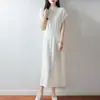 Nuevo vestido de punto de lana pura para otoño e invierno, importación transfronteriza, cuello redondo medio alto, manga corta, color liso, cintura alta, adelgazante, longitud media