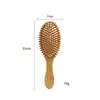 Pente de massagem com almofada de ar de bambu, uma ferramenta de modelagem de cabelo econômica e prática para uso doméstico, projetada para alisar, dar volume e realçar os cabelos. Apresenta uma base de bambu e uma almofada de ar de alta resiliência