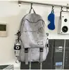Mochila con efecto de niebla fría, textura desgastada, tie-dye en tono gris, estilo para parejas, adecuada para el trayecto matutino y las salidas de los estudiantes universitarios.