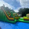Tobogán inflable con temática de dinosaurios de la jungla, diseño simulado de planta verde, fábrica de equipos inflables de entretenimiento comercial para exteriores