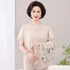Conjunto de dos piezas de outer de manga corta holgado para mujer de mediana edad, nuevo estilo otoño 2026, top de traje de manga larga para mujer de 50 años