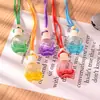 Colgante de perfume para coche de 10 ml, adorno colgante creativo con forma de manzana de colores para el espejo retrovisor del coche, botella vacía para aceites esenciales