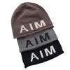 Gorro de Lana Mixta para Adultos, Estilo Igual para Pareja Aim Entity, con Protección para las Orejas, Casual Neutro con Bordes Ligeramente Enrollados