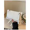 Bolso cruzado para teléfono móvil con remache cruzado, estilo coreano popular, exquisito bolso de hombro, versátil, casual, moda, bolso de mano europeo y americano para el día a día