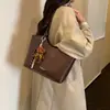 Bolso tote de moda de gran capacidad, nuevo bolso de hombro versátil para el verano, bolso de axila tote retro simple de moda