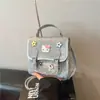 Bolsos de Mujer Transfronterizos Primavera y Verano 2026 Modelos Nuevos Exquisitos Súper Populares Bolsos de Moda de Gama Alta Hombro Único y Mochilas