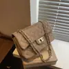 Versátil y a la moda, bolso tote de nicho de gran capacidad, nuevo bolso de hombro acolchado con cadena, bolso cruzado de alta gama estilo Chanel