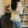 Bolso de mano de nicho para mujer 2026 nuevo de moda primavera alto valor para el trabajo bandolera tipo cubo bolso de hombro casual