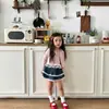 Nueva Colección Primavera y Otoño 2026: Conjunto Dulce y Ligero de Dos Piezas para Niñas, con un Cárdigan de Tirantes y un Atuendo Lindo para Salir