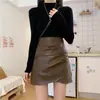 Minifalda negra para mujer, nuevo estilo primavera/otoño, talla grande, de cintura alta, plisada, que cubre la cadera, falda corta de línea A