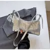Bolso de axila de estilo coreano moderno para mujer 2025 Verano Nuevo Casual Simple Estilo Suave Bolso bandolera de un solo hombro