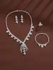 Juego de Cuatro Piezas de Lujo Ligero con Copos de Nieve y Borlas con Incrustaciones de Circonita: Collar, Pendientes, Pulsera, Anillo para Vestido de Novia, Vestido de Banquete
