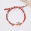 Pulsera tejida de concha de venta caliente transfronteriza, pulsera bohemia de hilo de algodón tejida a mano con borla, cuerda de mano de suministro directo de fábrica