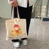 Inventario mayorista de comercio exterior último modelo grupo de suministro en vivo compra grupal ~ bolsa de lona de oso lindo de dibujos animados bolsa de hombro
