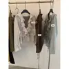 Blusa Manga Longa Ruffle Cintura Marcada Estilo Francês Suave Versátil Falso Duas Peças Chá Verde Limão Outono 2026 11025
