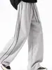 Calça de Moletom com Cordão Color Block e Listra Lateral para Homens e Mulheres, Design Amplo Emagrecedor, Estilo Preguiçoso, Calça Longa Casual Versátil