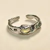 Anillo de piedra lunar irregular con ondas geométricas para hombre y mujer, anillo ajustable con apertura combinable, regalo ligero de lujo.