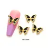 Accesorios metálicos para decoración de uñas de ojo de gato mariposa de circonita, decoración de uñas de aleación de rhinestone tridimensional súper brillante, colores oro y plata con goteo de aceite