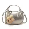 Bolsa de mão moderna estilo coreano para mulheres, novo modelo da primavera de 2026, alto valor estético, sensação única e descontraída, bolsa de ombro única e transversal