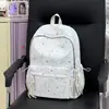 Nueva mochila de dibujos animados de estrellas linda transfronteriza para estudiantes de secundaria femeninas, alto valor estético, simple, ligera, de gran capacidad, con doble hombro