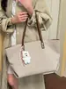 Bolso de cubo de mano nuevo Yozzi otoño temprano, elegante y exquisito, adecuado para salir, bolso de hombro cruzado, bolso de trabajo para mujer