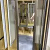Produção atacado federal Gao Deng mesmo estilo shopping espelho de prova espelho telescópico de guarda-roupa doméstico espelho de guarda-roupa dobrável de puxar e empurrar