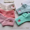 Calcetines navideños transfronterizos para mujer, calcetines de media pantorrilla para otoño e invierno, bordado de dibujos animados en colores caramelo, absorbentes de sudor, resistentes al olor, calcetines de algodón de color liso al por mayor