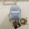 Mochila Bordada Estrela Estilo Menina Coreana para Estudantes Universitárias, Mochila Versátil de Grande Capacidade para o Dia a Dia