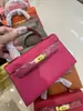 Elegante bolsa Kelly 2026 com fivela de prata e padrão de mão, nova moda feminina, bolsa de mão de segunda geração com fivela dourada, bolsa de ombro e transversal