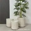 Jarrón de piso a rayas de moda decoración de sala de exposiciones de hotel maceta de óxido de magnesio para el hogar arreglo floral decoración de edificio de oficinas planta verde