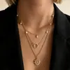 Collar de perlas de tres capas estilo francés para mujer, anillo de perla de imitación gota de agua, patrón de corazón y sol, collar de clavícula multicapa de circonita