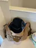 Bolso de mano casual y sencillo para mujer, bolso de hombro y cruzado de gran capacidad, nuevo bolso de hombro moderno y de moda 2026