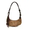 Bolso de un solo hombro para mujer, simple, versátil, para el trabajo, tipo bolsa de albóndiga, nicho, de alta gama, moda, bolso baguette, bolso de axila para mujer, transfronterizo