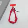 Estilo ins correa de teléfono tejida de color contrastante correa corta para la muñeca colgante de llavero de cámara CCD anti-pérdida unisex