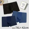 Calzoncillos de Seda de Leche de Cintura Alta Cómodos Elásticos Pantalones Estampados Baotou Venta al por Mayor de Ropa Interior para Hombre