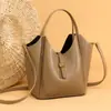 Comércio Exterior Mais Vendido Bolsa de Mão Tipo Balde em Couro Genuíno Bolsa de Ombro Versátil em Couro Macio de Alta Qualidade Bolsa Transversal de Grande Capacidade para o Dia a Dia para Mulheres