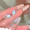 Asa de Anjo Super Fada Presilha de Orelha Feminina Temperamento Pequeno e Requintado Clipe de Osso da Orelha de Cristal Azul Doce e Cool Pendente de Orelha Versátil