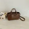 Bolsa Tote Pequena de Textura Simples e Alta Qualidade para Mulheres 2026 Novo Estilo Coreano Bolsa de Mão Super Fashion Bolsa Transversal para o Dia a Dia