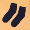 Cuatro estaciones pueden usar calcetines nuevos para hombre de color liso calcetines casuales clásicos para hombre de algodón transpirables calcetines deportivos para hombre al por mayor