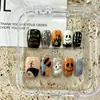 Uñas vestibles de Halloween superventas transfronterizas europeas y americanas, piezas de arte de uñas de calabaza, calavera y fantasma puramente hechas a mano, productos terminados para venta al por mayor de alta gama