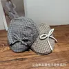 Boné Forward Xadrez com Laço Fofo Estilo Coreano para Mulheres Primavera/Verão 2026 Moda Casual Redutor de Idade Boina Doce Atacado