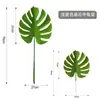 Venta caliente de Amazon hojas tropicales artificiales flores plantas verdes con césped floral decoración del hogar manualidades de plantas verdes