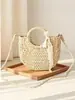 Bolsa de paja tejida a mano de alto volumen para tienda nueva, bolso de mano de media luna para mujer, bolso cruzado, bolso tipo cubo redondo, bolsa versátil de cesta de verduras